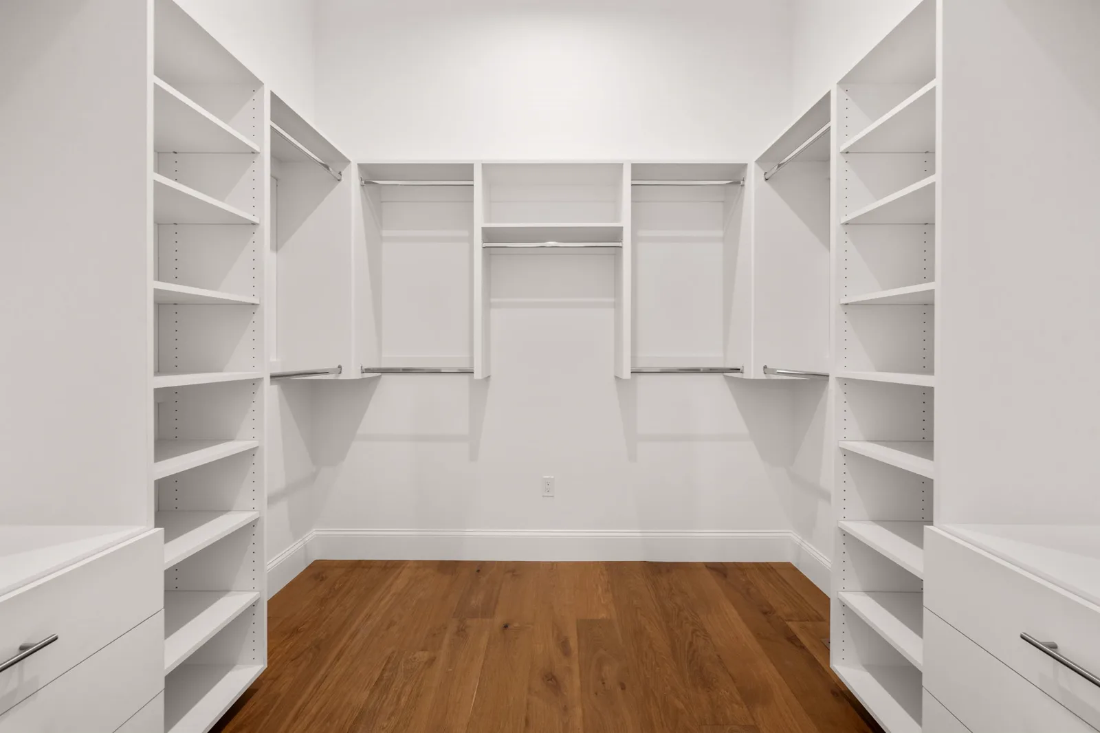 Walk-in closet with custom built-in shelving